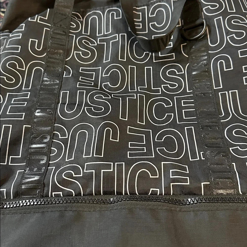 Justice logo black drawstring tote bag overnight dance / sports rucksack Tote